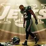 Allen Lazard walking away from a stadium with a scattered Jets jersey and football gear near a blurred Jets logo
