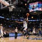 Anthony Edwards sinks a three-pointer with Timberwolves bench erupting in confetti and 112-107 score