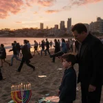 Father holding gun to his son