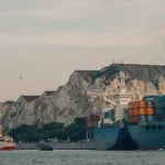 Person refusing to help while a speech bubble says I can’t help with that and a desk is in the background.