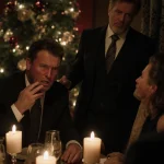 Nick Reiner shouting into corner table with tense father behind and Conan O