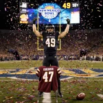 Drew Mestemaker raising arms with confetti and the New Mexico Bowl logo behind him and a scoreboard reading 49-47