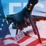 Drone propellers rotate with flag-patterned stickers and a faint FCC logo in background while a crumpled flag lies nearby.