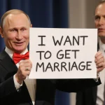 Young journalist holding a sign that reads I want to get married with Putin