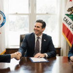 Governor Gavin Newsom shaking hands with Susan Monarez and Dr. Debra Houry in a sunlit California office with CDC logo