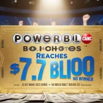 Golden ticket shines on news desk with bold blue headlines about $1.7 billion jackpot and no winner spotlight glowing