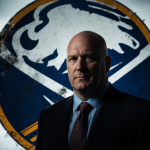 Jarmo Kekalainen stands confidently with a faded Buffalo Sabres logo behind him and a dim cityscape of Buffalo in background