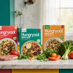 Kitchen island showing Hungryroot meal kits with fresh vegetables and natural light