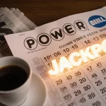 Lottery ticket unfolding revealing Jackpot sign with coffee and newspaper nearby