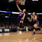Olivia Miles driving to basketball hoop with Marta Suarez cheering from sidelines and golden light spills hardwood in TCU are
