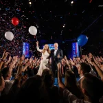 Erika Kirk announcing endorsement with confetti and Vance beside her