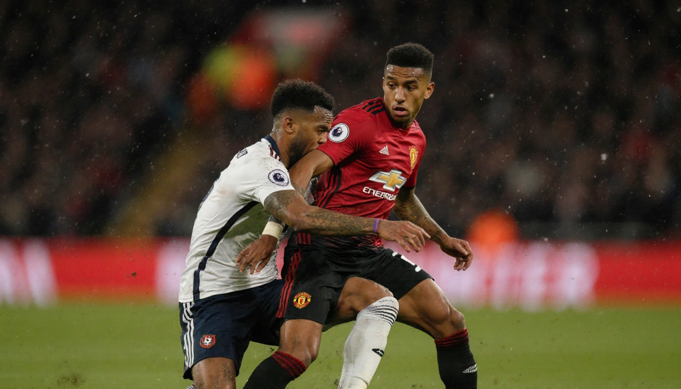 Tyler Adams struggling in tackle with Matheus Cunha tangled legs and arm outstretched stadium lights Manchester vs Bournemout