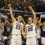 Azzi Fudd and Sarah Strong celebrate women