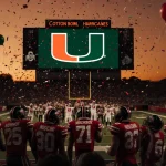 Miami players celebrating victory with confetti and balloons while the stadium scoreboard displays the Hurricanes logo