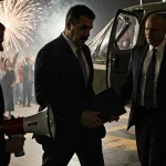 Nicolás Maduro steps out of a helicopter landing pad with two DEA agents and fireworks over Brooklyn.