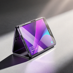 Smartphone unfolds from Galaxy Z Trifold case with purple glass display against silver-gray background